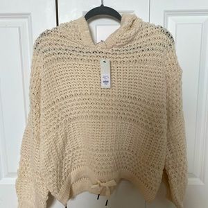 cream colored sweater